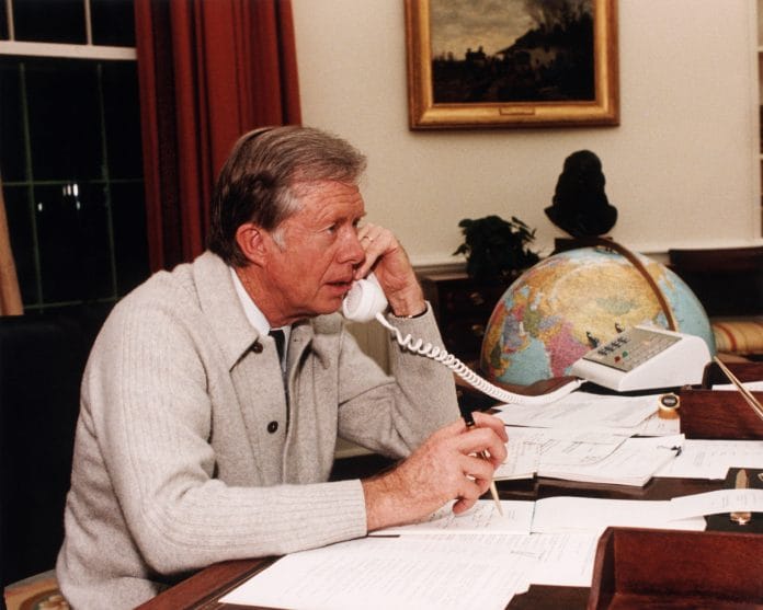 Jimmy Carter wearing a sweet cardigan.